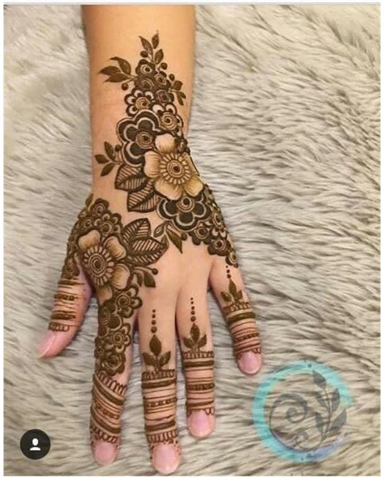 Modern Sketch With Scallop Covering Back Hand Mehndi Design